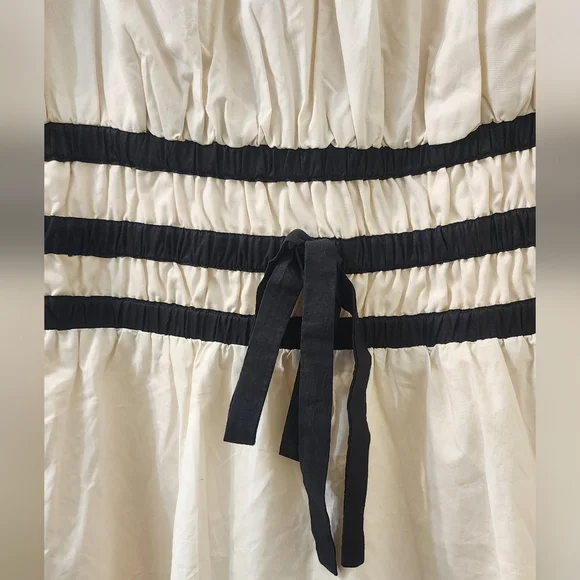 Aureum Elegant Cream Dress with Black Accents - Picture 3 of 11